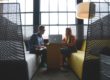 Two People Collaborating in an Office Space